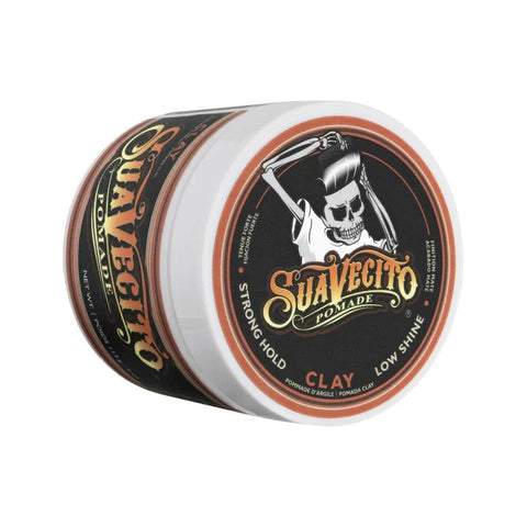 Suavecito Clay Pomade - gesloten pot schuin met oranje deksel en logo