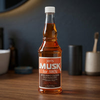 Jeris Hair Tonic - oranje fles op houten blad in barbershop