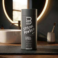 Level3 Styling Powder - strooibus op donkere leisteen bij ronde spiegel en waskom